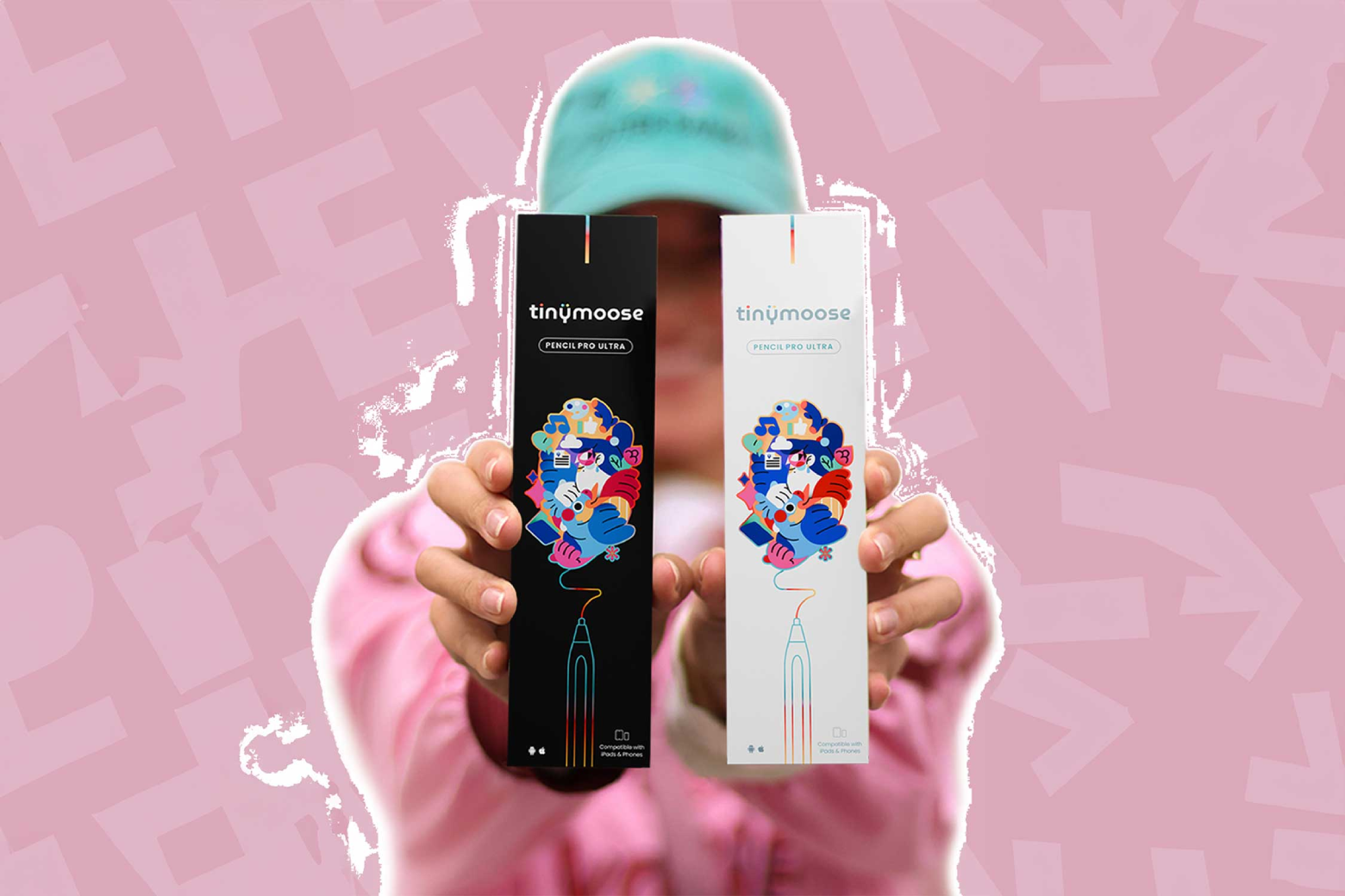 Marketing image of a woman holding Tinymoose Pencil Pro Ultra stylus pen boxes.