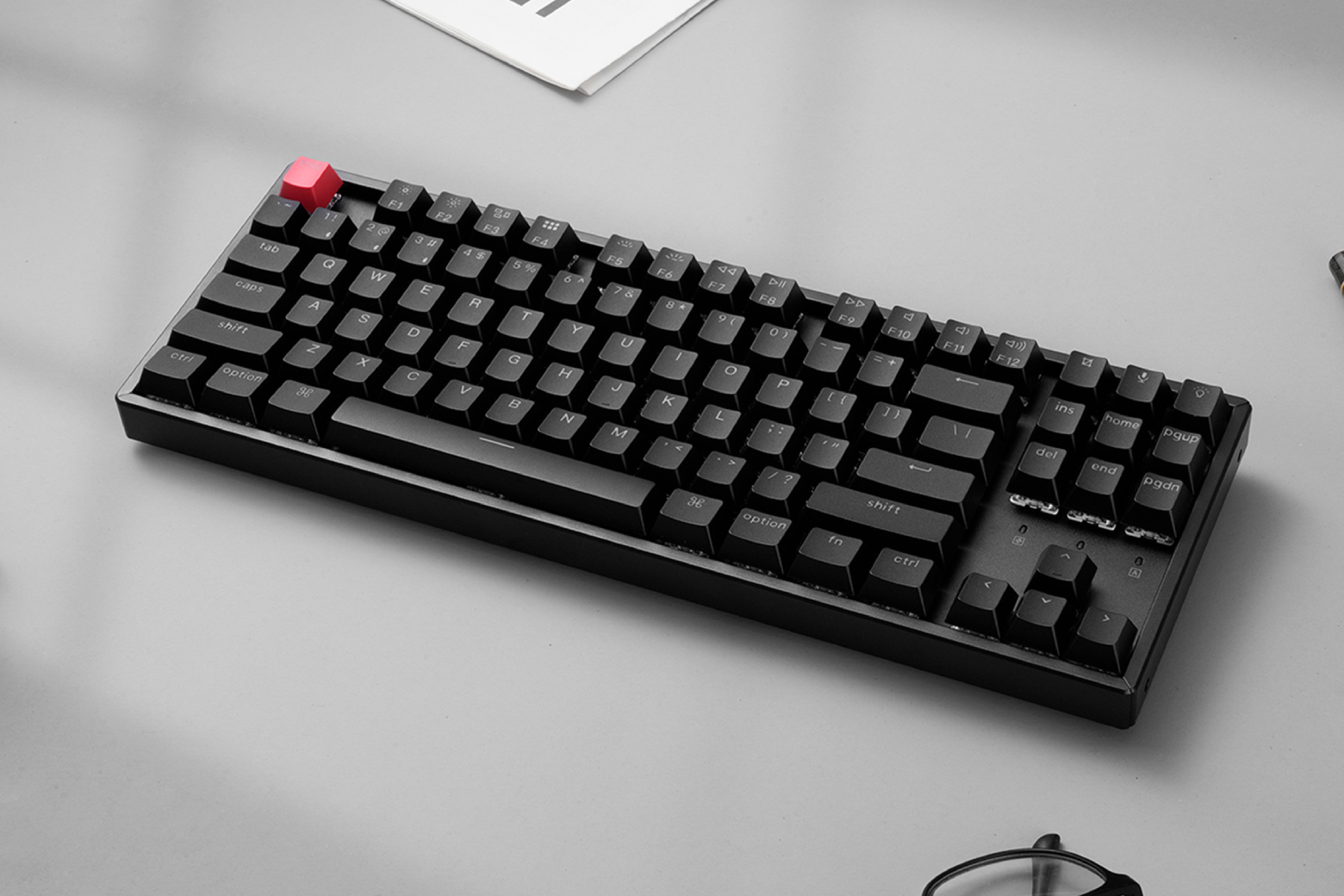 Photo of Keychron K8 mechanical keyboard on a desk.