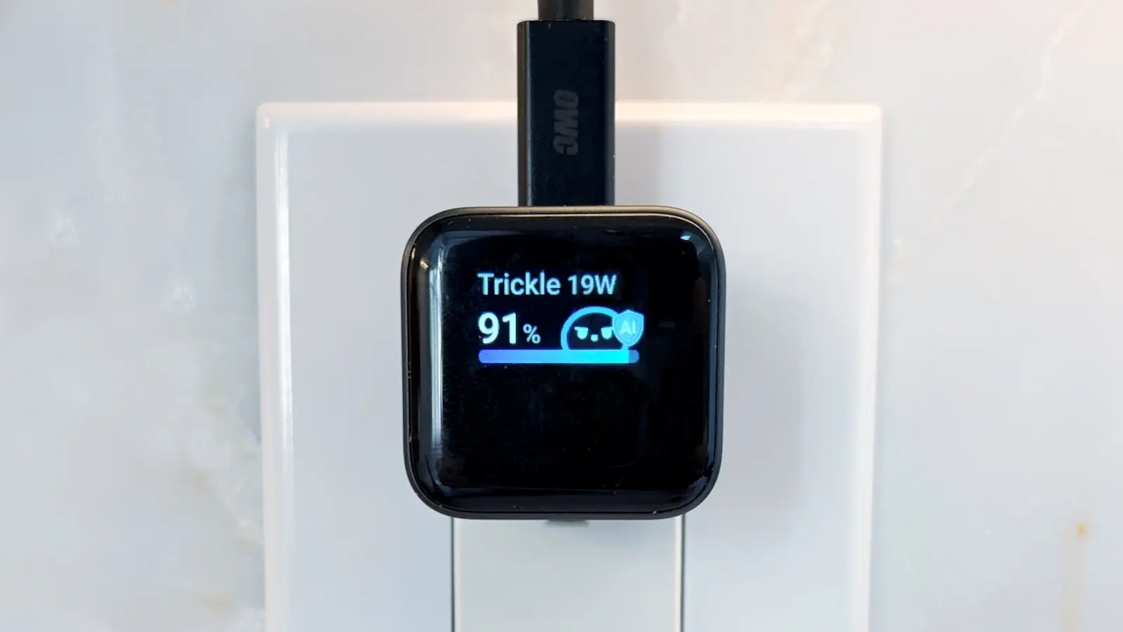 Anker Nano Charger (45W, Smart Display, 180° Foldable) in a wall socket