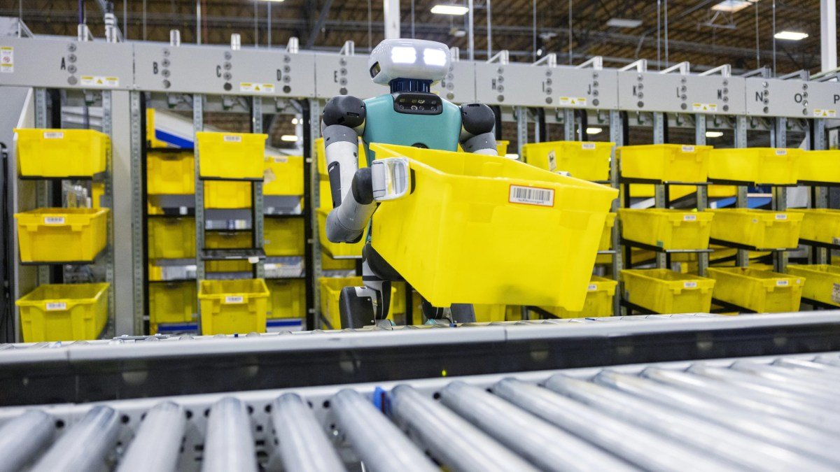 A Digit robot works in an Amazon distribution center.
